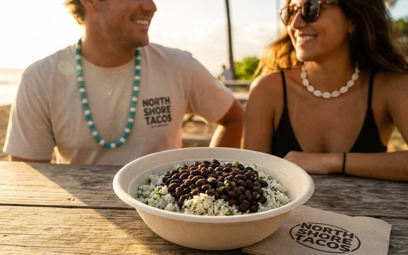 Burrito bowl base layer with cilantro lime rice and slow-cooked black beans side by side